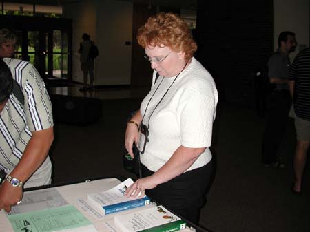 Checking out the goods at the conference desk