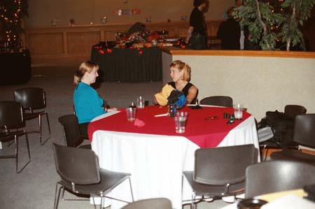 An attendee speaking with Kimberly Koester. Photo courtesy of Steve Stacy