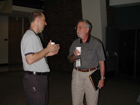 Chris Bell and Perry Main talk during a break