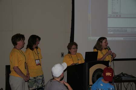 The Loomis Ladies (Marge Bauer, Mary Gutwein, Tina Rice, and Lucy McKain) giving a Hack Ack with great soccer photos. 