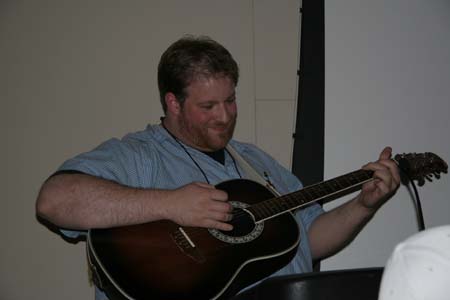 Matt Hermiz using his guitar chops to add to the evening